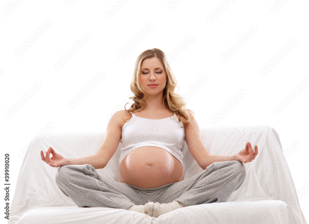 A young and happy pregnant blond Caucasian woman A young and happy pregnant blond Caucasian woman