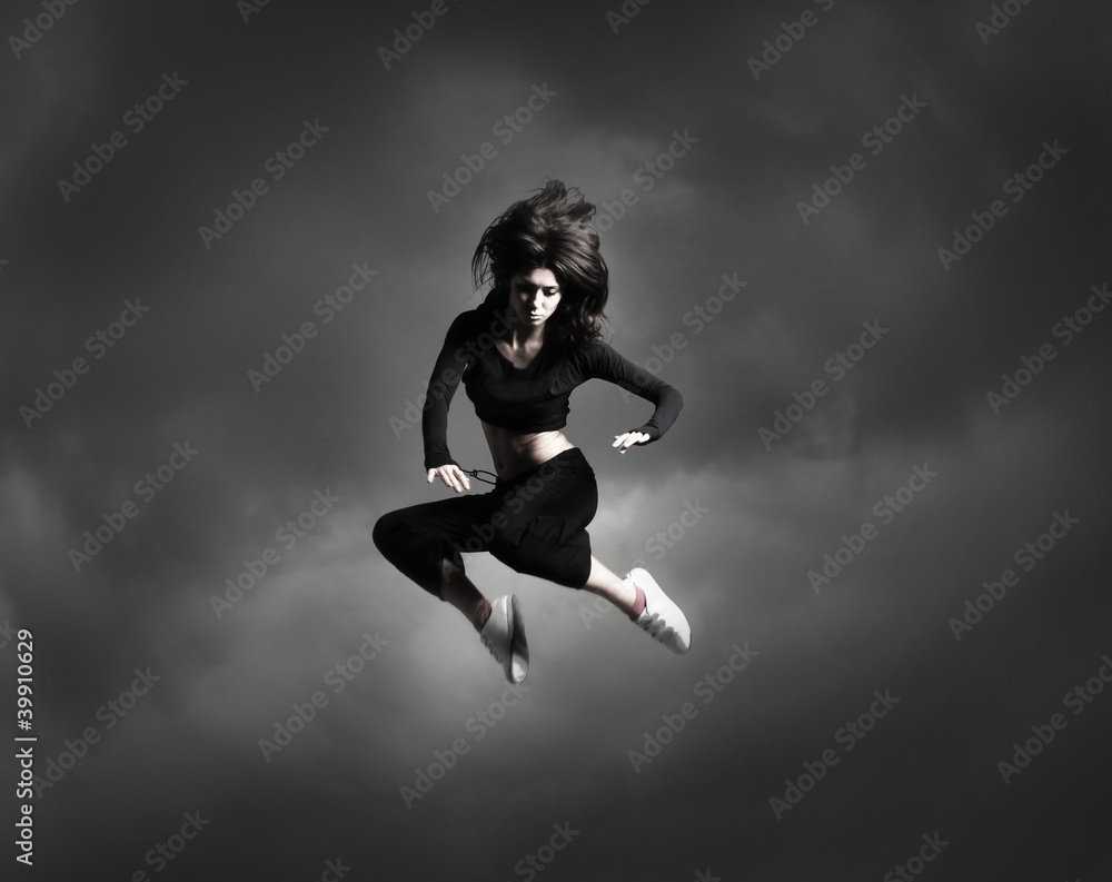A young and attractive brunette female dancer A young and attractive brunette female dancer