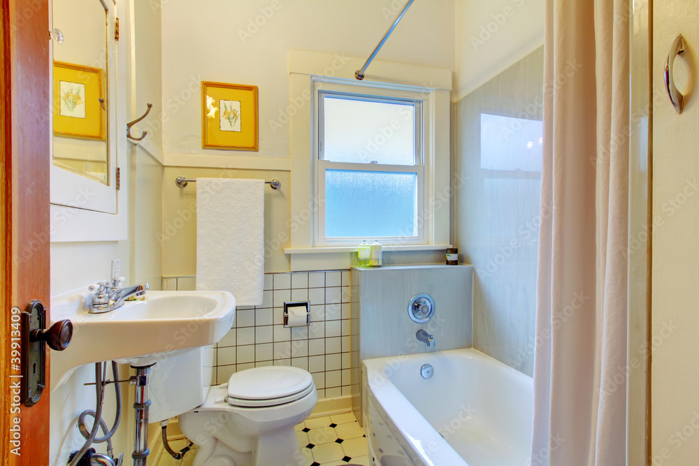 Retro simple bathroom with old sink and tiles. Retro simple bathroom with old sink and tiles.