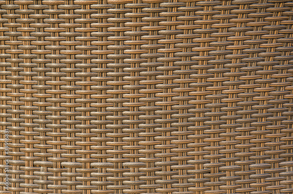 Obraz premium Back of a wicker-like chair