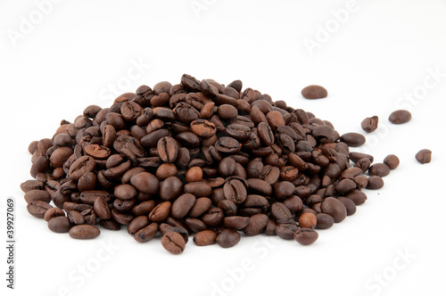 Coffee. Hill coffee beans on a white background.