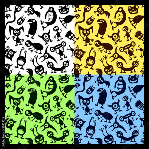 Aliens and monsters. Four seamless vector patterns.
