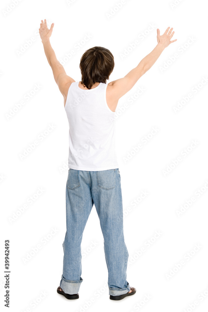 young man standing with his hands young man standing with his hands