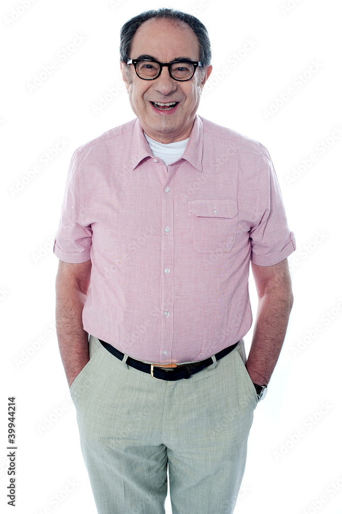 Smiling casual senior man with hands in pocket Smiling casual senior man with hands in pocket
