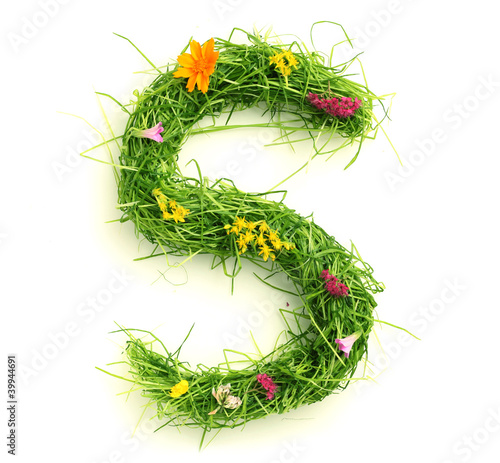 Letters made of flowers and grass