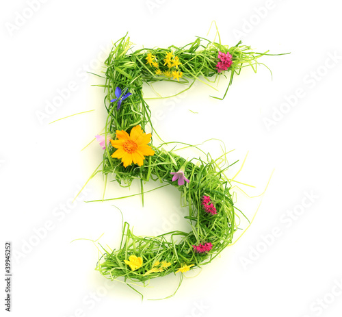 Numbers made of flowers and grass