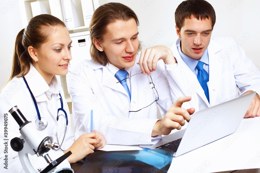 Young doctors at work Young doctors at work