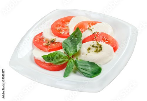Arrangement of mozzarella and tomatoes