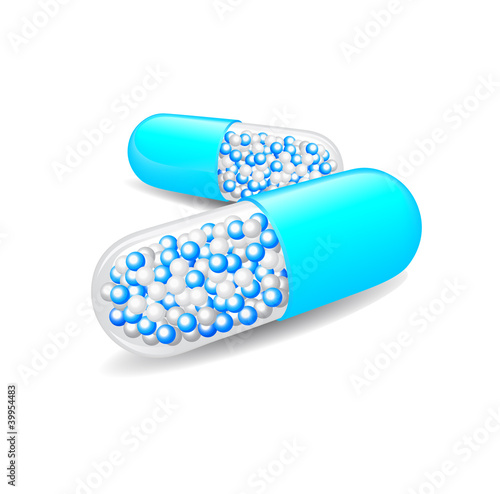 tablet with white blue granules inside