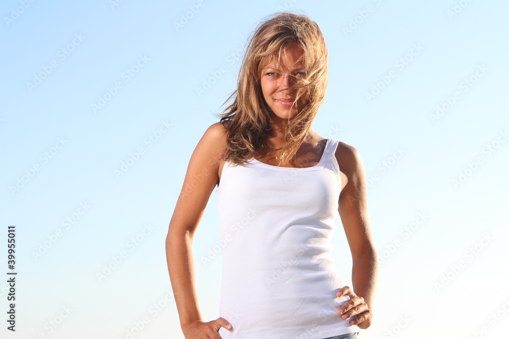 young beautiful woman on sky background young beautiful woman on sky background