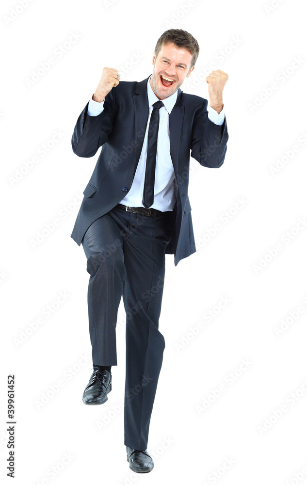 Excited handsome business man with arms raised Excited handsome business man with arms raised