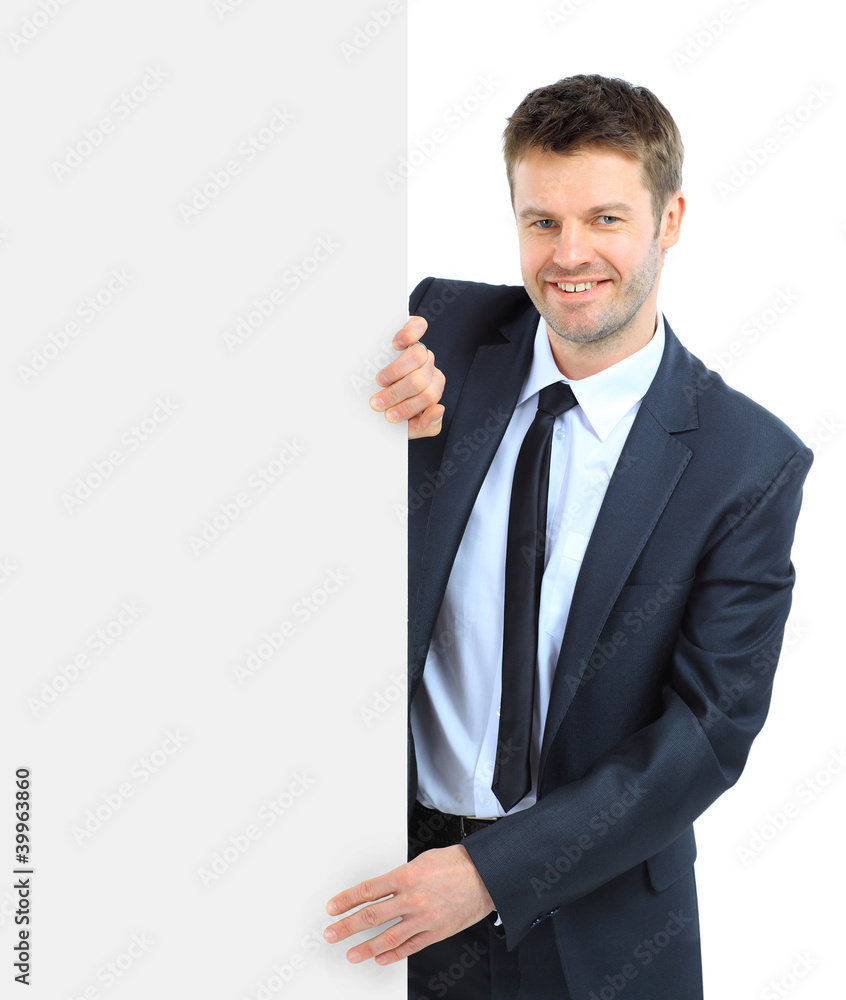 Happy smiling business man showing blank Happy smiling business man showing blank