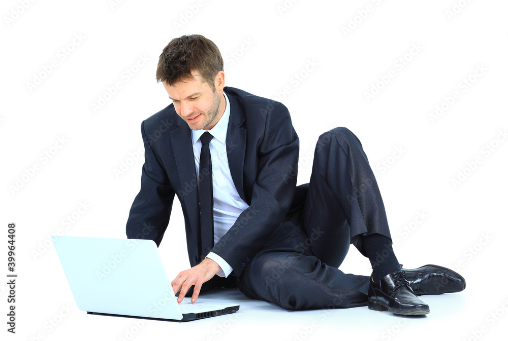 Happy young business man working on a laptop, Happy young business man working on a laptop,