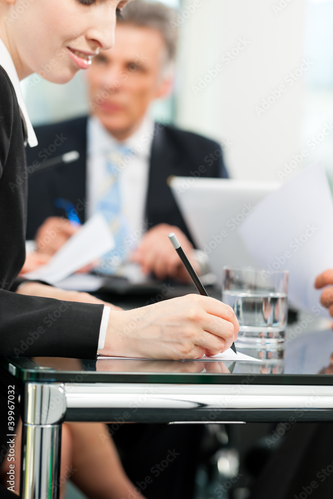 Business meeting with work on contract Business meeting with work on contract