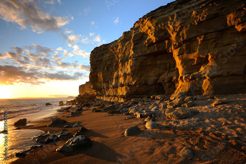 Fotografie Golden sandstone cliffs at hive beach near Bridport Dorset.