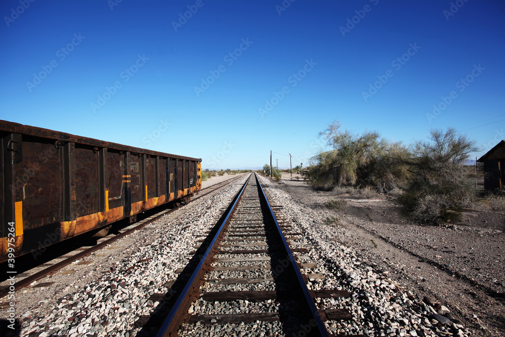 View of Train Tracks, Southwestern US, with Coal Car on Siding