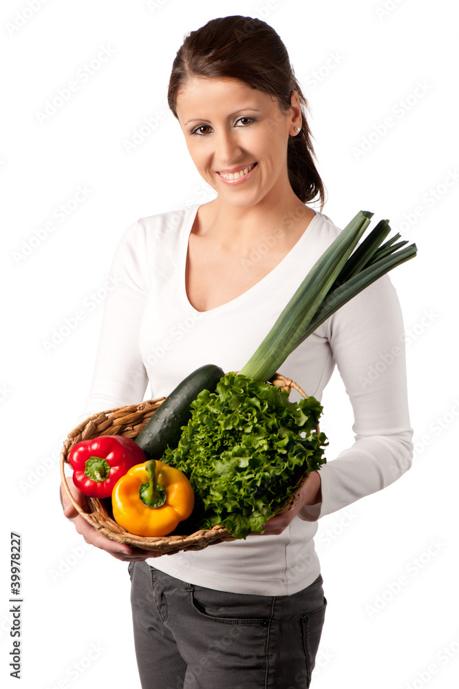 Attractive young woman with basket of vegetables Attractive young woman with basket of vegetables