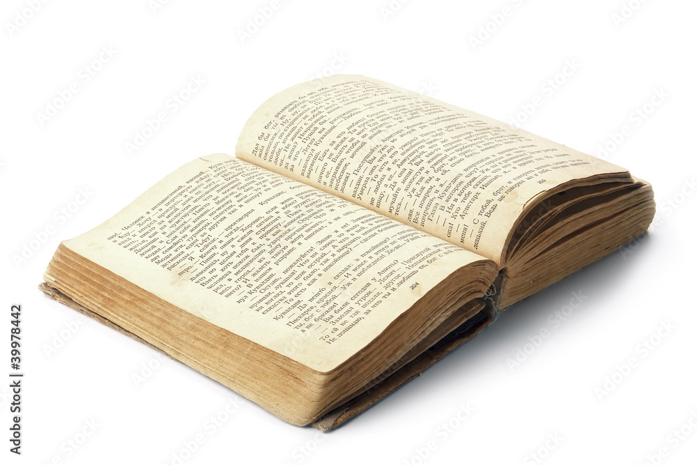 Obraz premium Ancient opened book isolated on white background