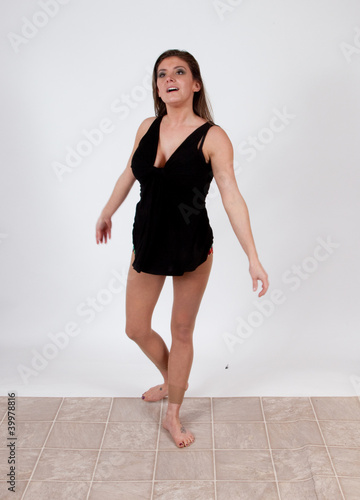 Dancing woman with long brown hair