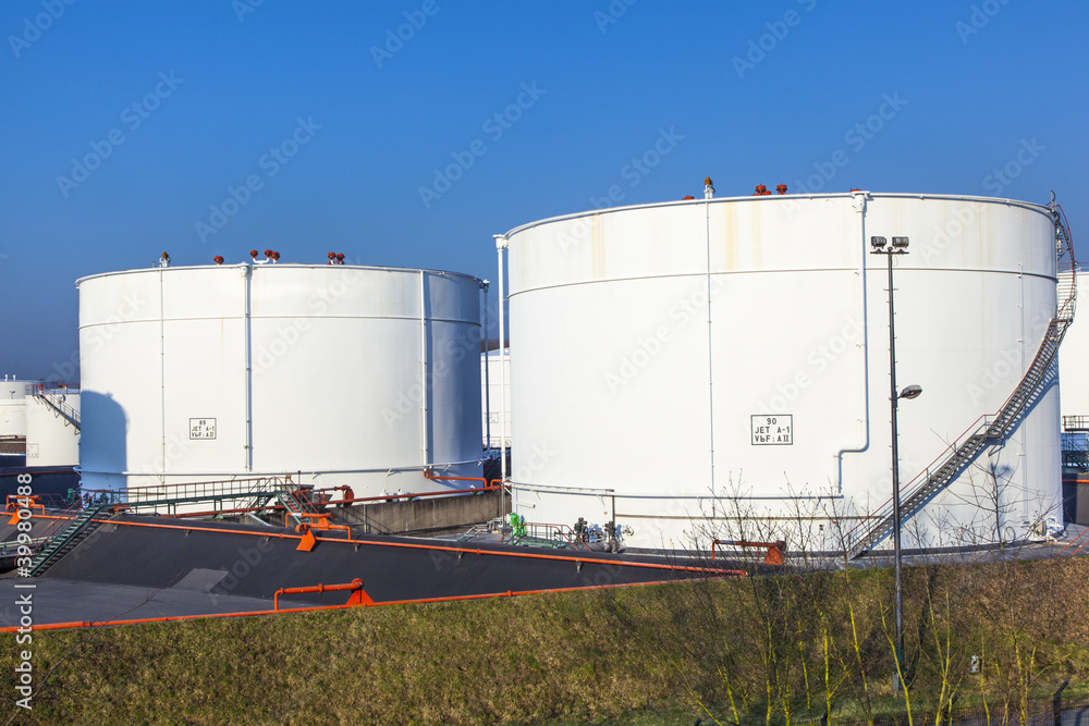 white tank in tank farm with blue sky white tank in tank farm with blue sky