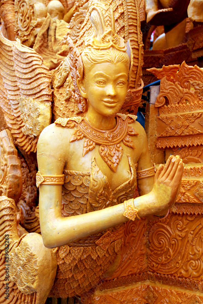 Fototapeta premium A candle carvings active festival Buddhist Lent