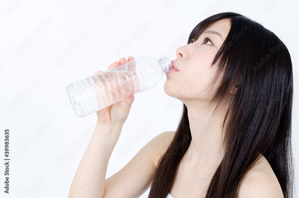 attractive asian woman with bottle of water attractive asian woman with bottle of water