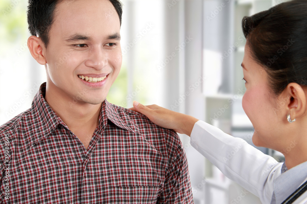 Doctor talking to a male patient Doctor talking to a male patient