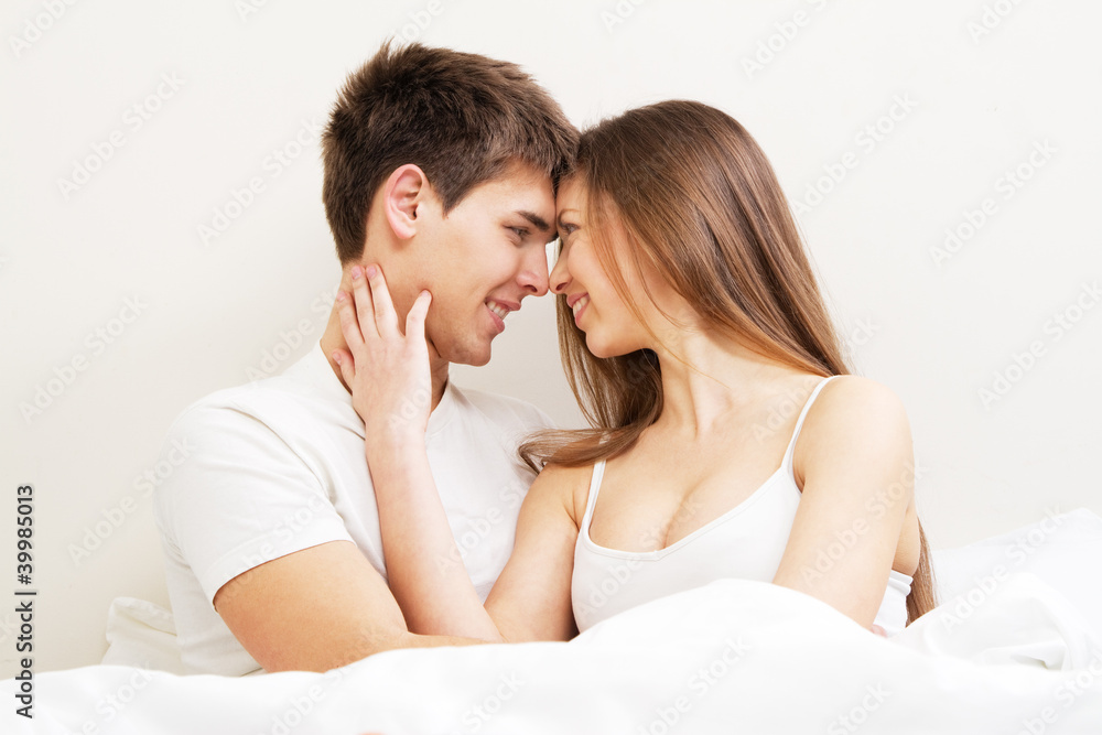 Beautiful young couple in bed Beautiful young couple in bed