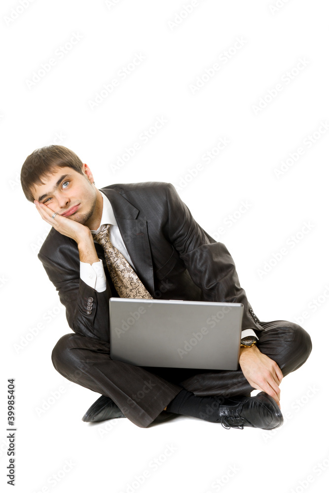 Young men with his laptop with a bored face isolated on white Young men with his laptop with a bored face isolated on white