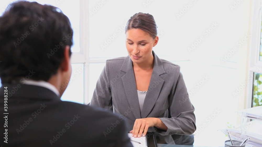 Business people shaking hands after a meeting Business people shaking hands after a meeting