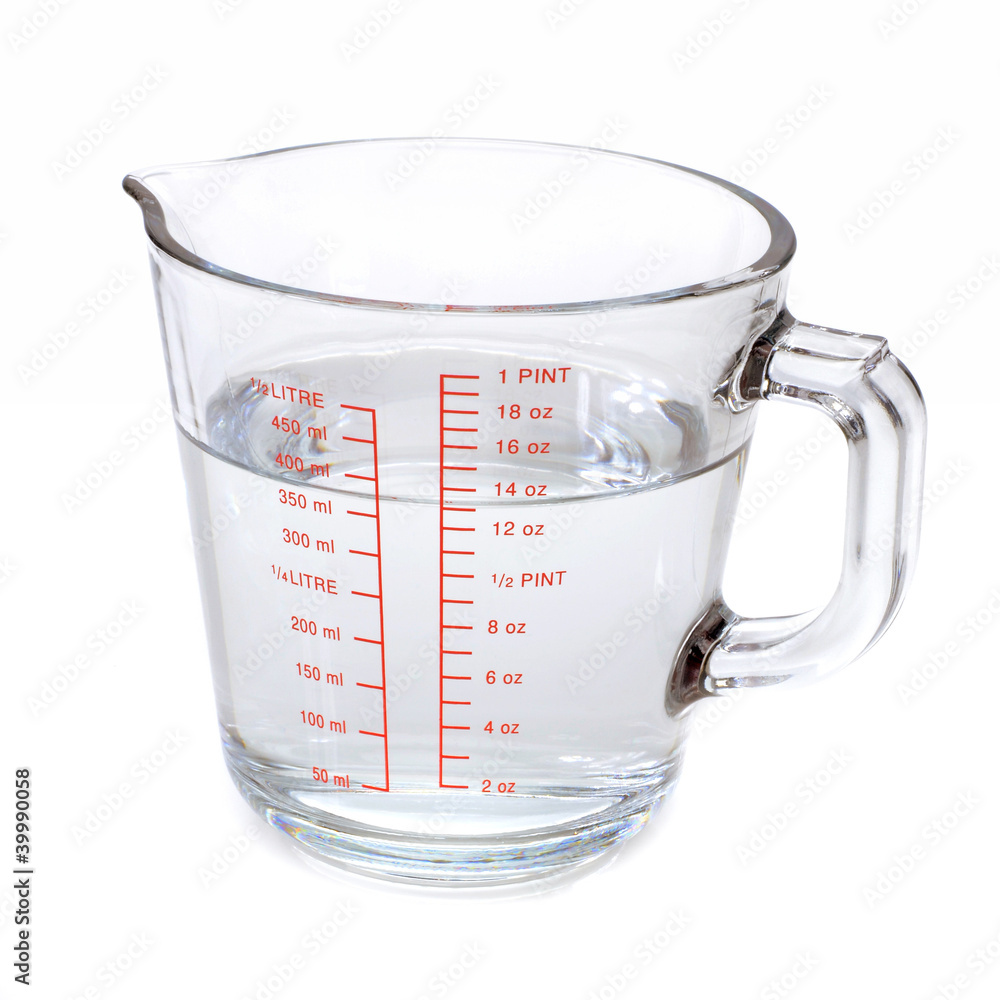 Water In Glass Measuring Cup Isolated On White Background Stock Photo 