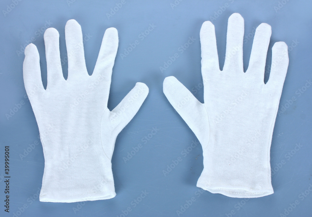Obraz premium cloth gloves on blue background.