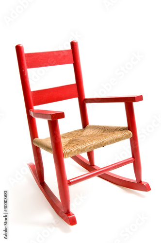 Foto Vintage childs rocking chair isolated on white
