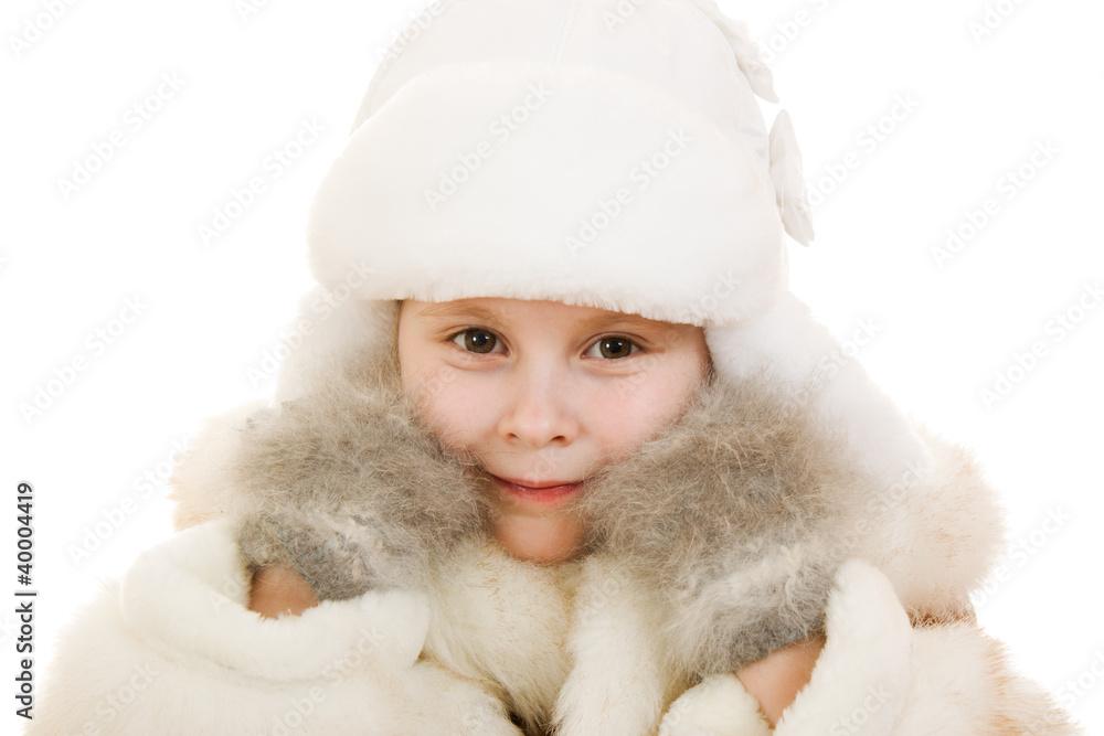 The girl in warm clothes smiling on white background. The girl in warm clothes smiling on white background.