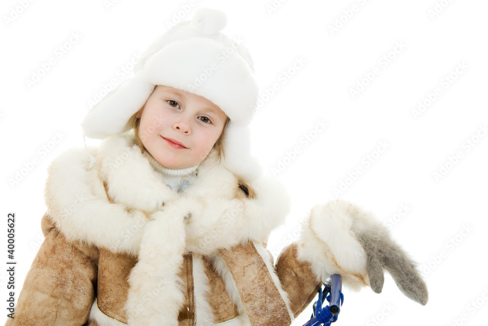 The girl in warm clothes smiling on white background. The girl in warm clothes smiling on white background.