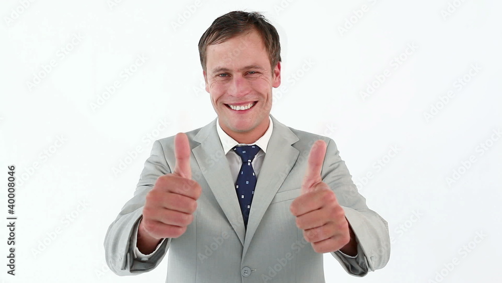 Businessman placing his thumbs up Businessman placing his thumbs up