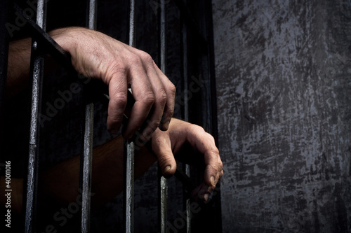 Canvas Print Hands of the prisoner