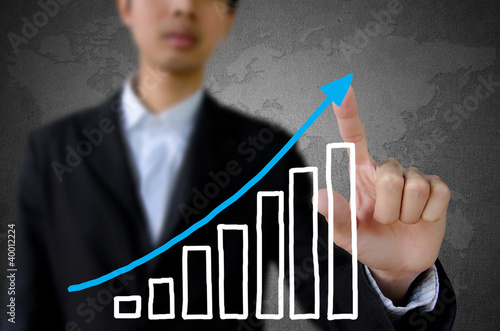 businessman hand pointing showing graph.