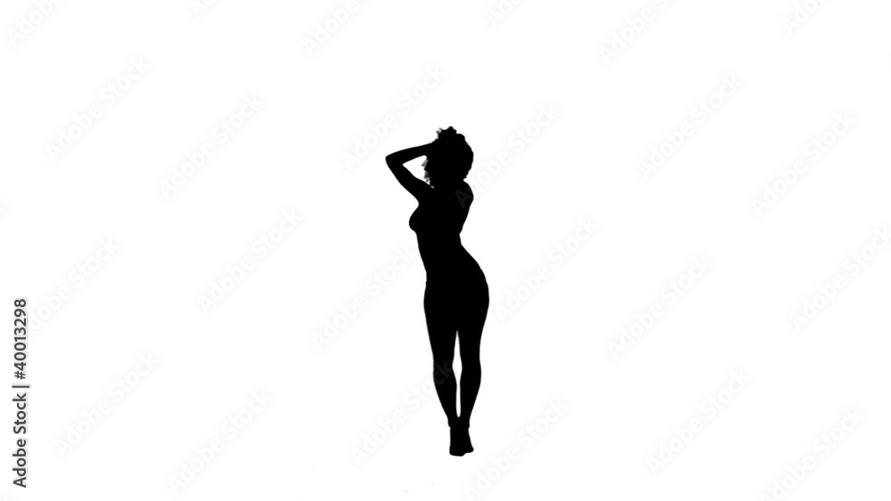 Silhouette of a dancing woman on her own Silhouette of a dancing woman on her own