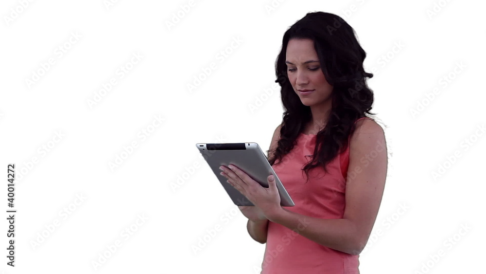 Woman pressing the screen of her tablet computer Woman pressing the screen of her tablet computer