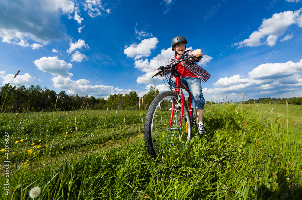 Cyclist - boy riding bike