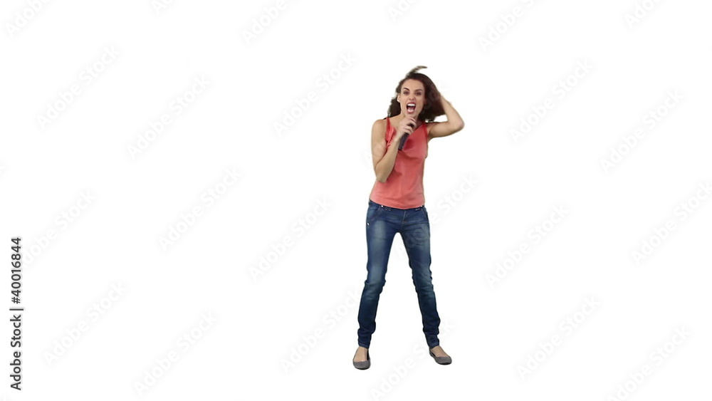 Energetic woman with a microphone is singing Energetic woman with a microphone is singing