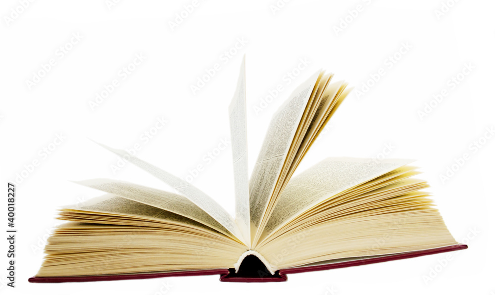 an open book lying on the table an open book lying on the table
