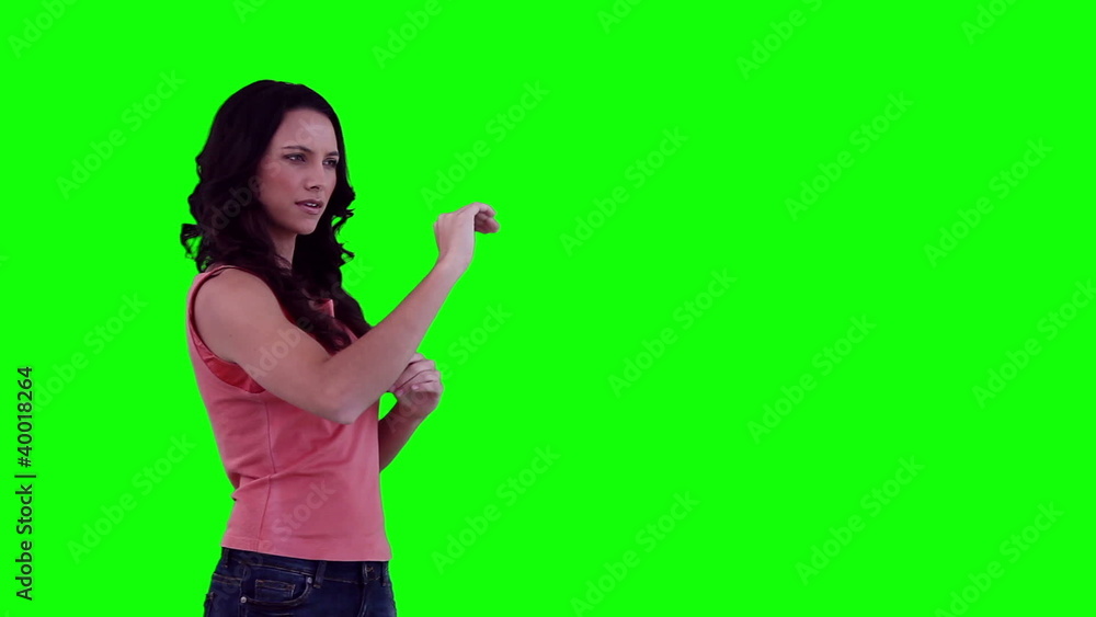 Woman scrolling through items on a virtual touchscreen