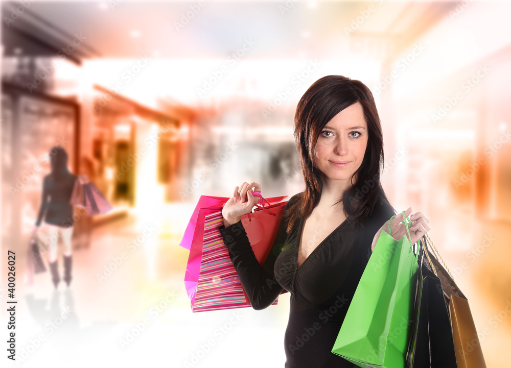 Shopping young woman in the shopping mall.