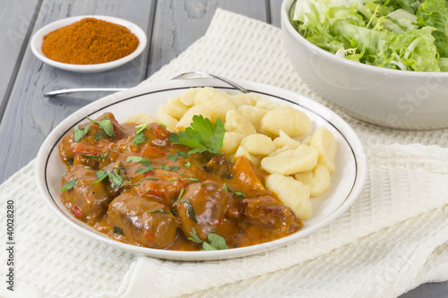 Goulash - Hungarian sausage stew with homemade nokedli & salad