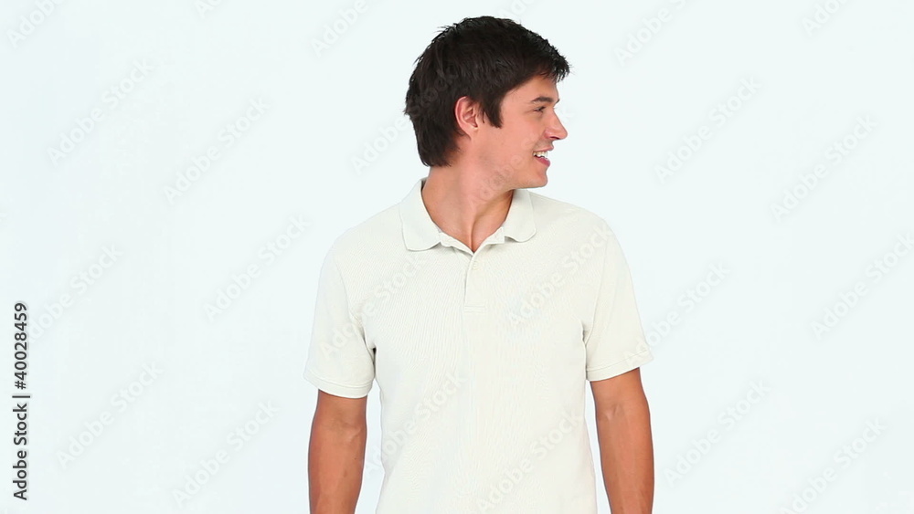 Man turning his head while standing Man turning his head while standing