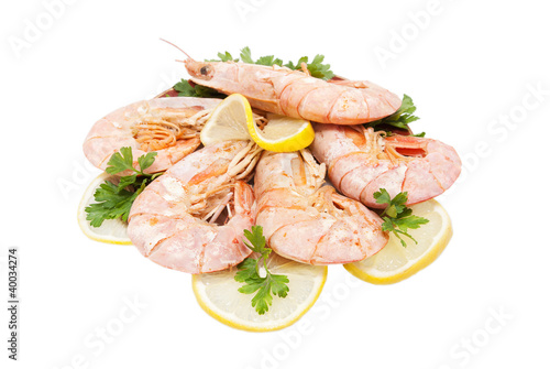 appetizing tiger shrimps with lemon slice and parsley