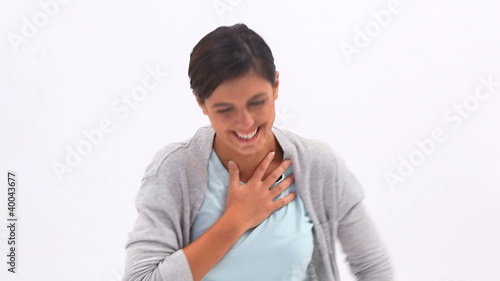 Brunette woman giggling