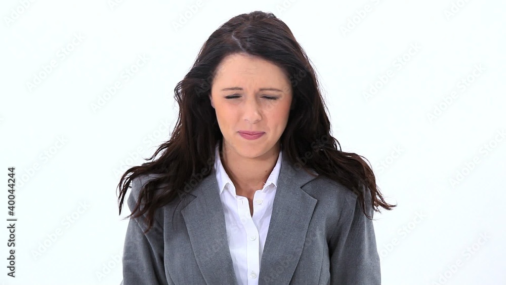 Brunette businesswoman pulling her hair Brunette businesswoman pulling her hair
